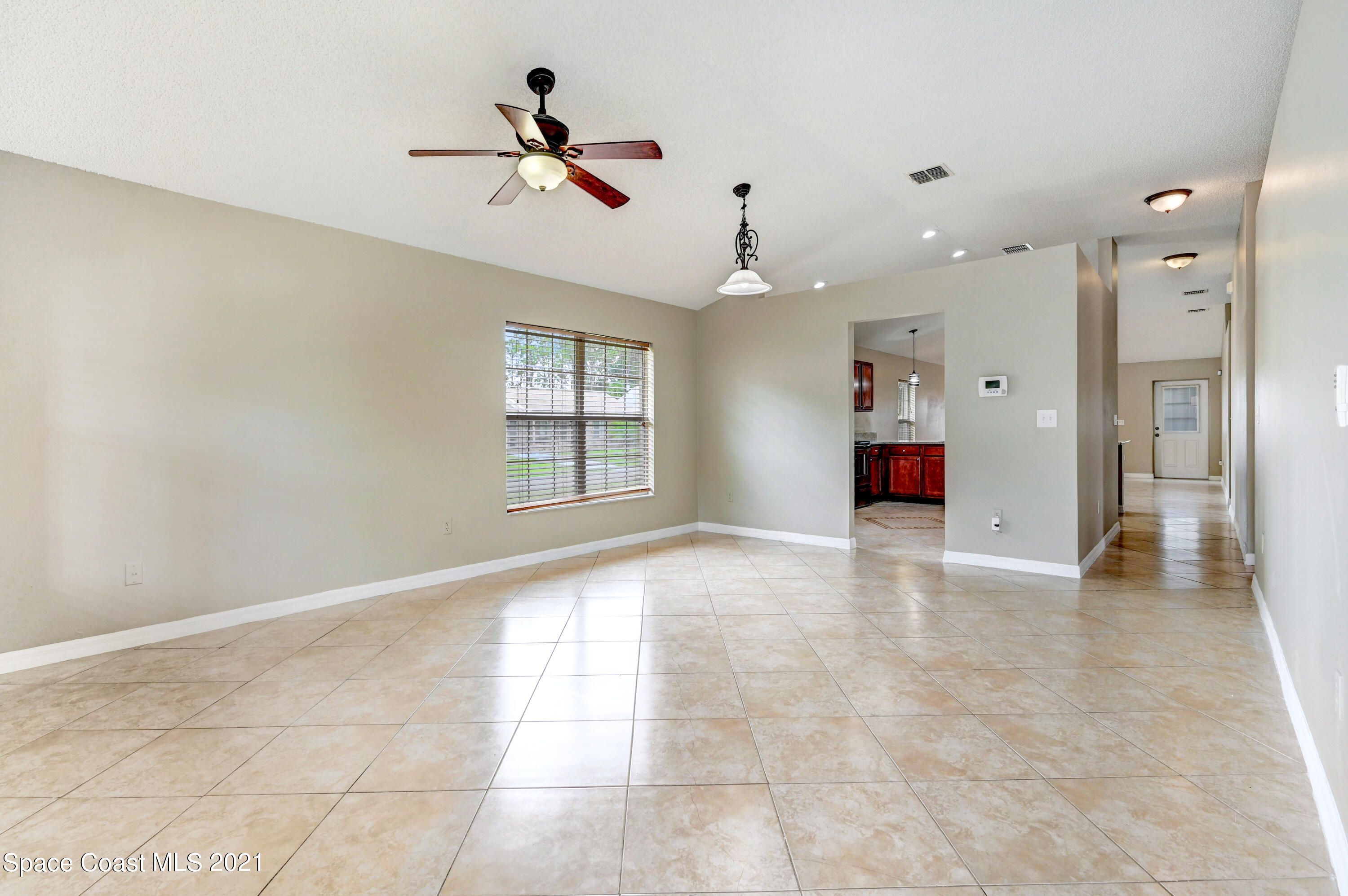 707 Atlantis Road Southeast Palm Bay, FL 32909 - Photo 4 of 26 DSC_1238