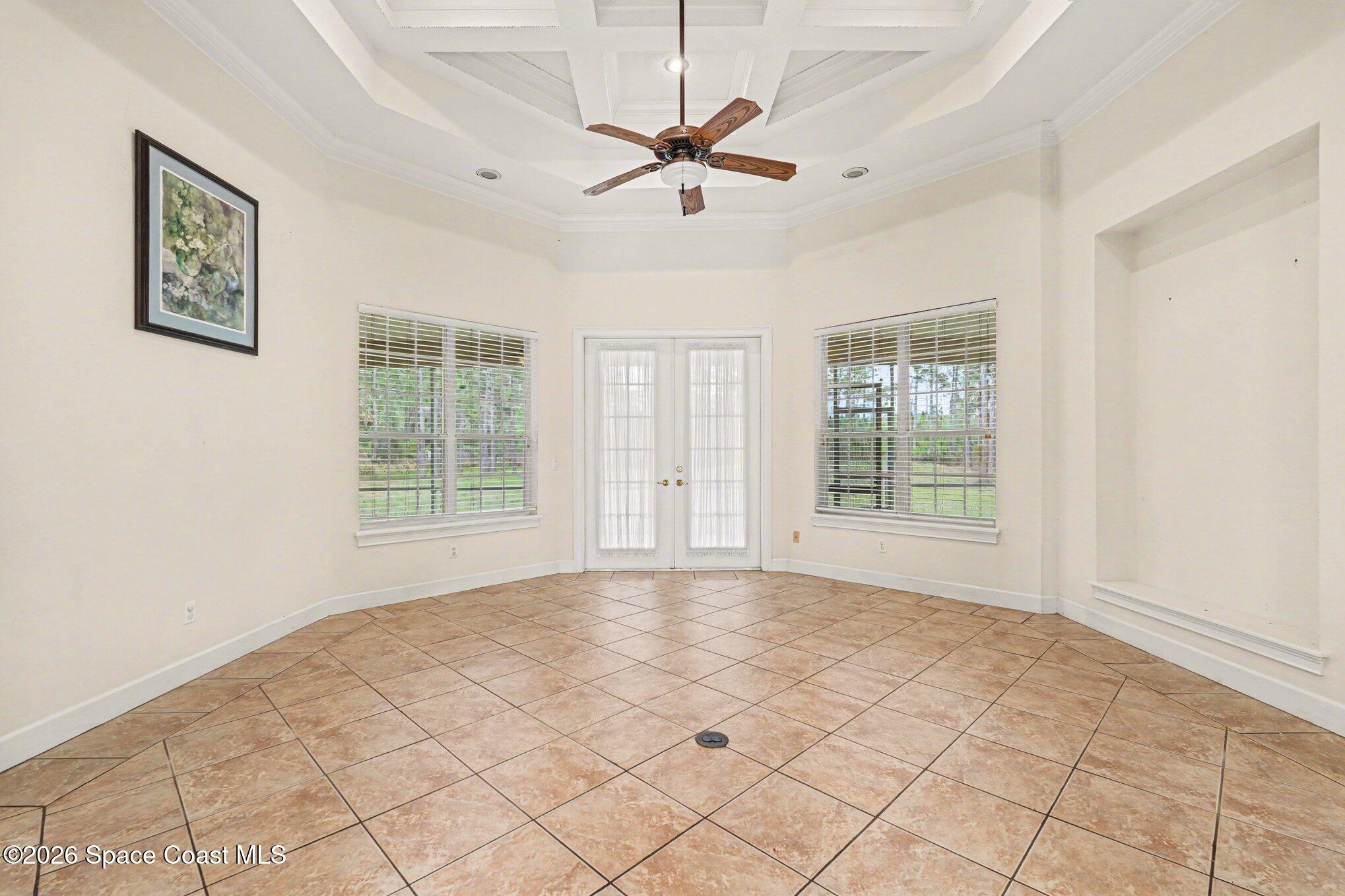 1399 Snapping Turtle Road Mims, FL 32754 - Photo 17 of 51 a view of an empty room with a window