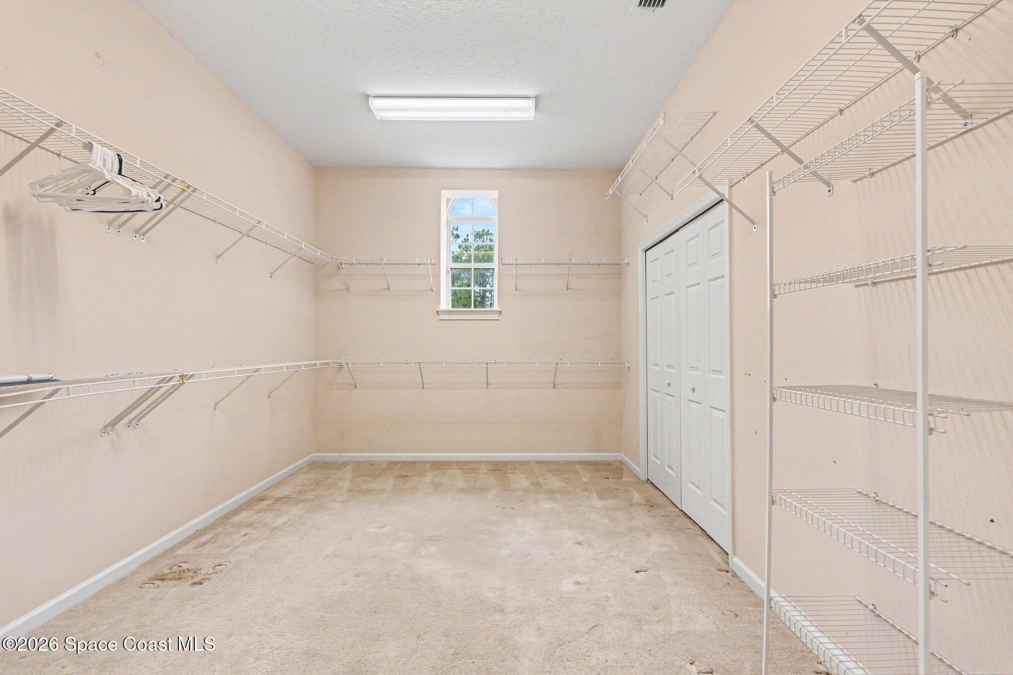 1399 Snapping Turtle Road Mims, FL 32754 - Photo 26 of 51 a view of a room that has a window in it