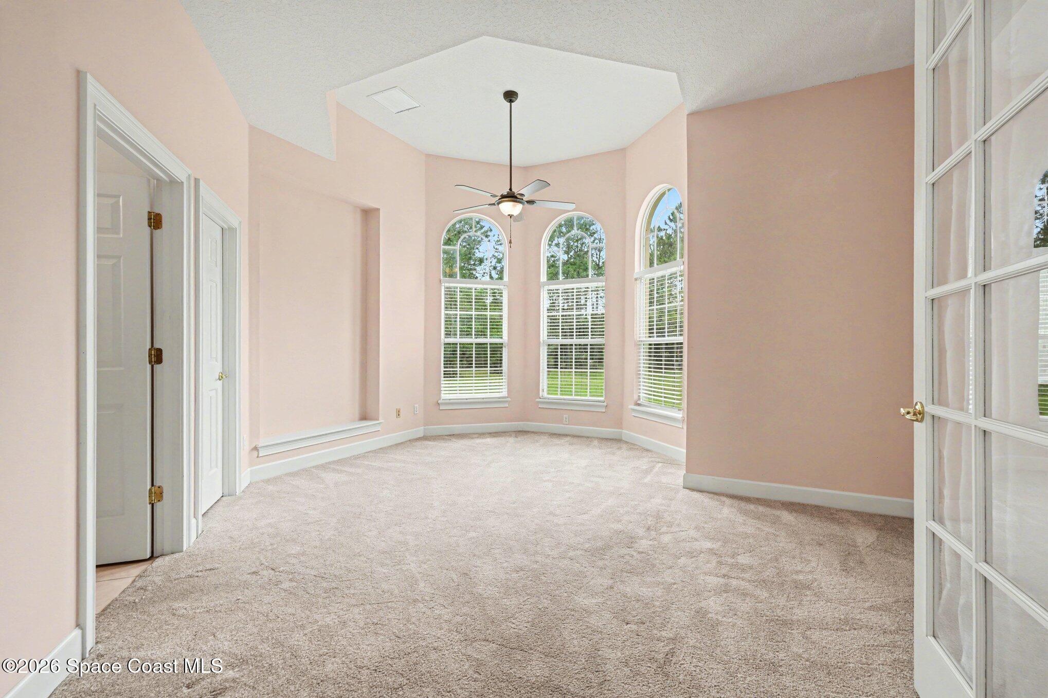 1399 Snapping Turtle Road Mims, FL 32754 - Photo 32 of 51 a view of an empty room with a window
