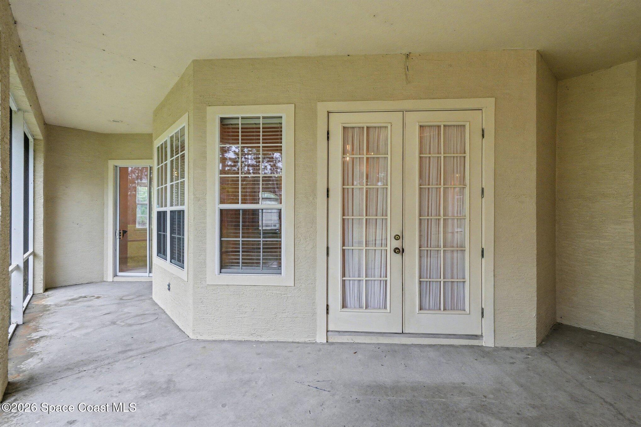 1399 Snapping Turtle Road Mims, FL 32754 - Photo 39 of 51 an empty room with windows
