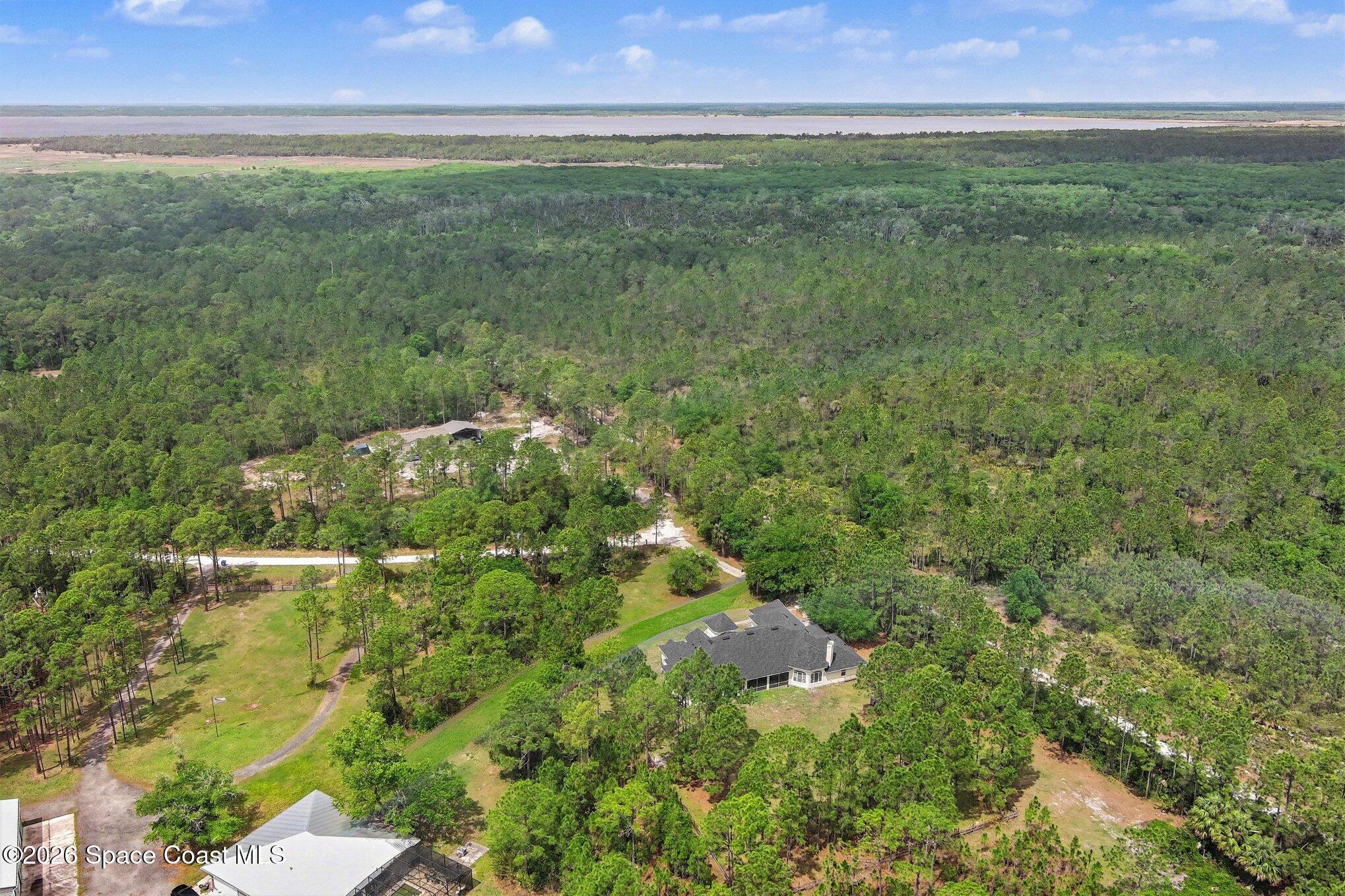 1399 Snapping Turtle Road Mims, FL 32754 - Photo 44 of 51 a view of a green field
