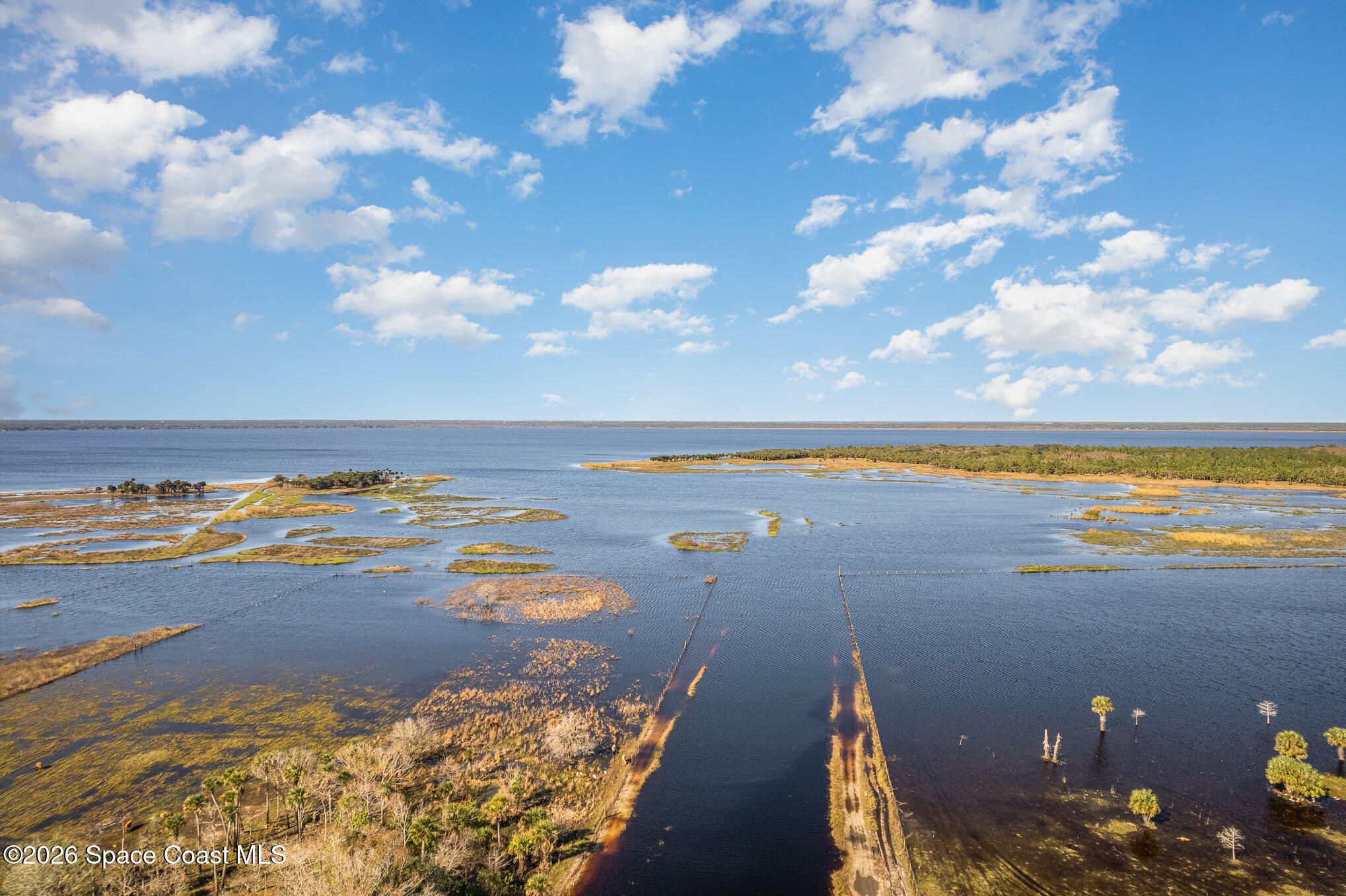 1399 Snapping Turtle Road Mims, FL 32754 - Photo 50 of 51 a view of an ocean and beach