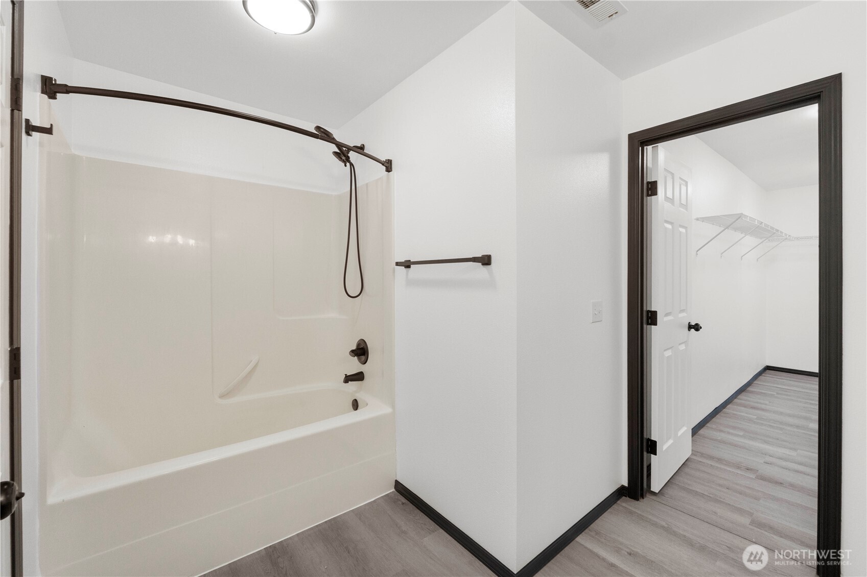 116 Mazza Street Northeast Orting, WA 98360 - Photo 26 of 39 a bathroom with a bathtub and a shower