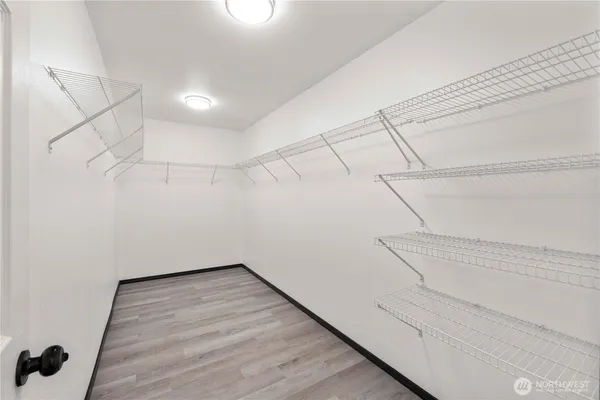 a view of a room with racks on the wall