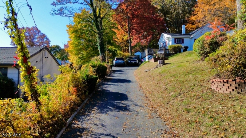 57 Terrace Avenue Butler, NJ 07405 - Photo 12 of 20 a view of a pathway with flower garden