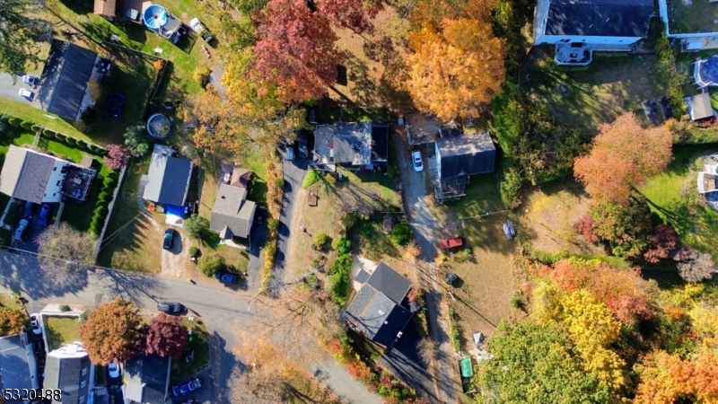 57 Terrace Avenue Butler, NJ 07405 - Photo 17 of 20 an aerial view of waterside residential houses with outdoor space