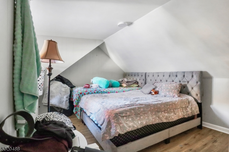57 Terrace Avenue Butler, NJ 07405 - Photo 7 of 20 a bedroom with a bed and window