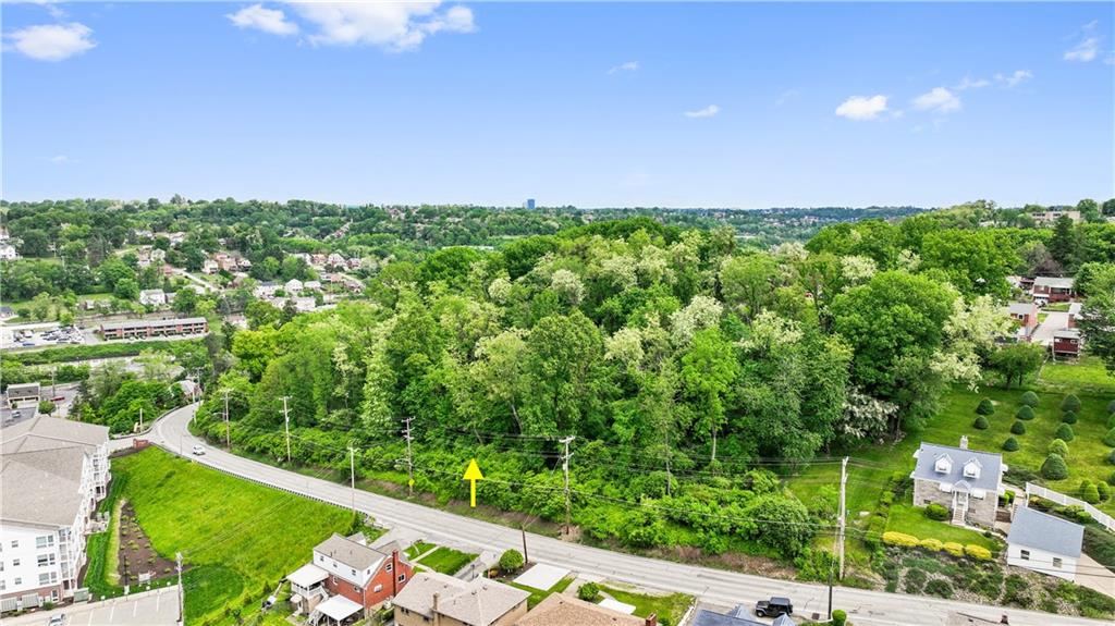 1261 Hamilton Road Pittsburgh, PA 15234 - Photo 15 of 17 a view of a garden with an outdoor space and seating area