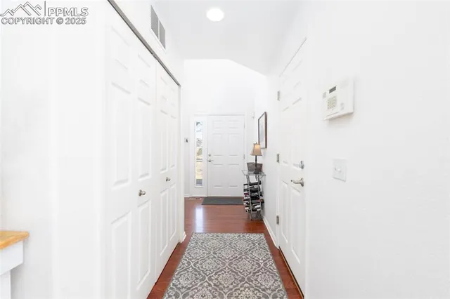 a view of hallway with stairs