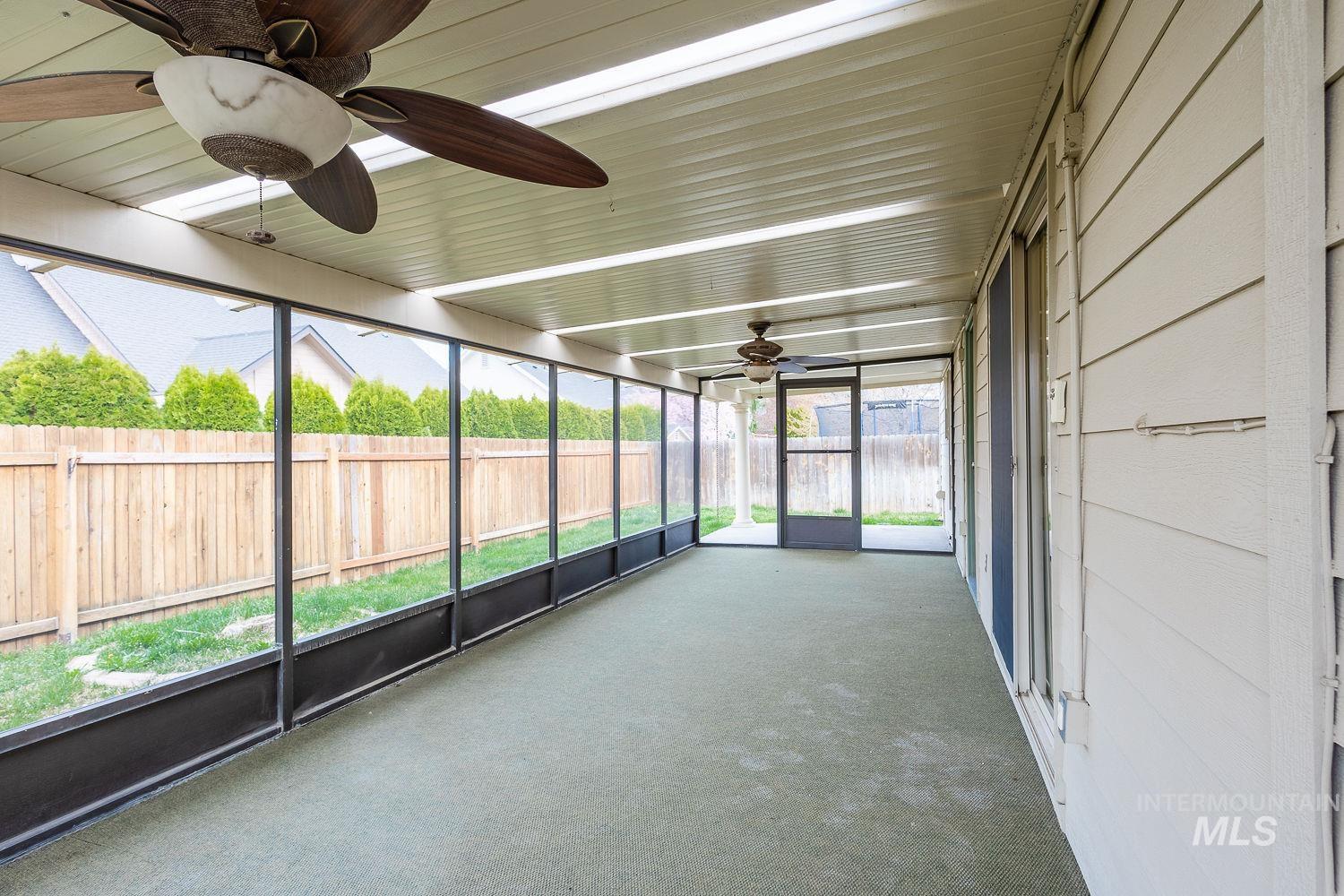 4227 North Rhodes Avenue Meridian, ID 83646 - Photo 40 of 42 Unfurnished sunroom with a ceiling fan