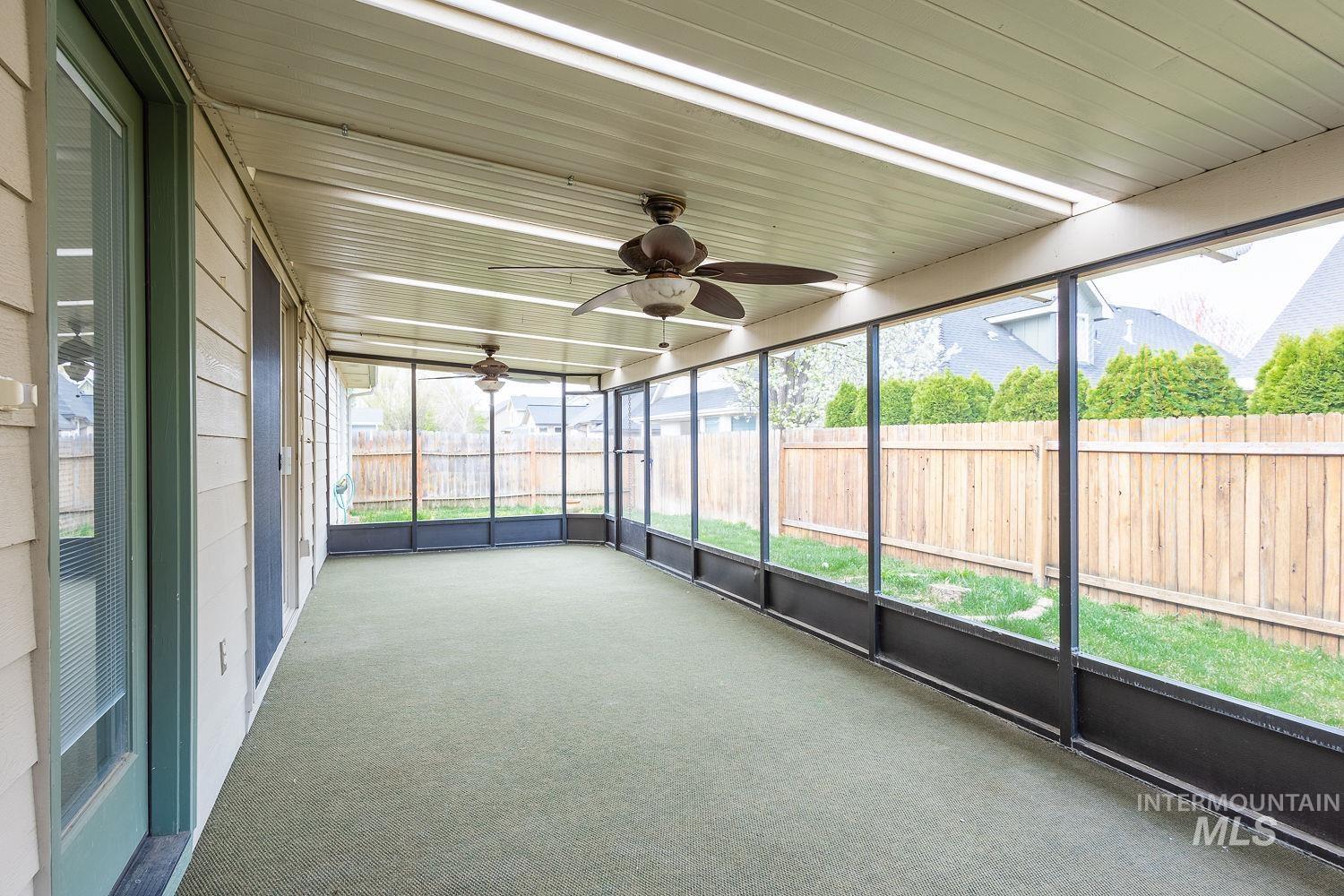 4227 North Rhodes Avenue Meridian, ID 83646 - Photo 41 of 42 Unfurnished sunroom with a ceiling fan