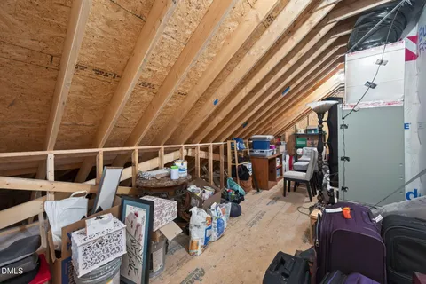 a view of a house with wooden walls