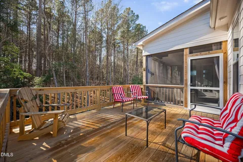 a view of a chairs and table on the wooden floor
