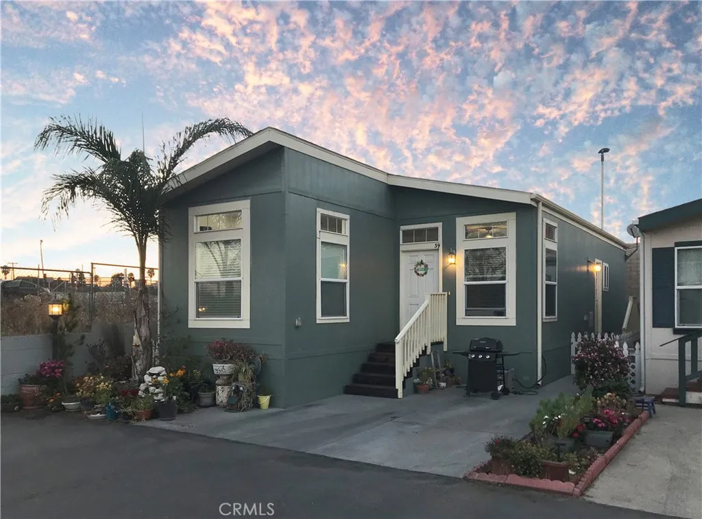 a front view of a house with patio
