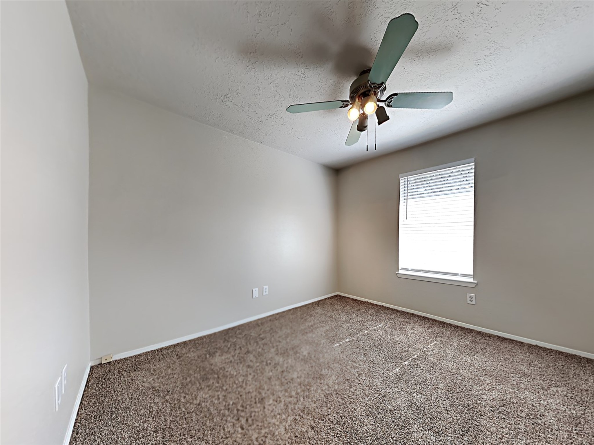 14919 Wainsfield Lane Channelview, TX 77530 - Photo 9 of 17 an empty room with windows