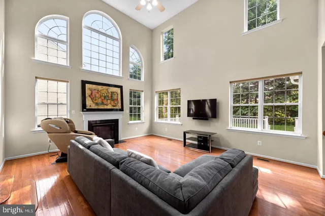 a living room with furniture or couch and a flat screen tv