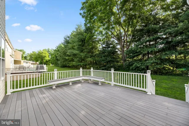 a view of deck with wooden floor and fence