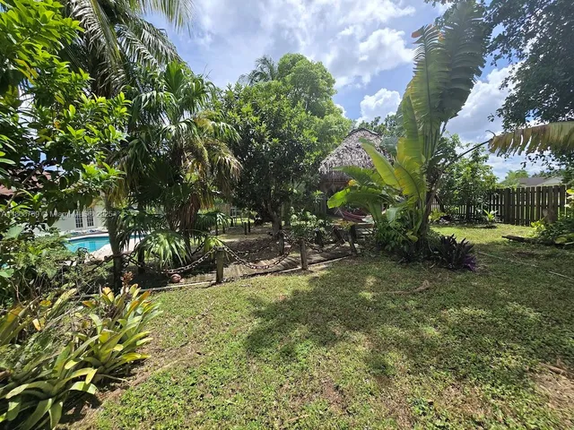 a view of swimming pool with a garden