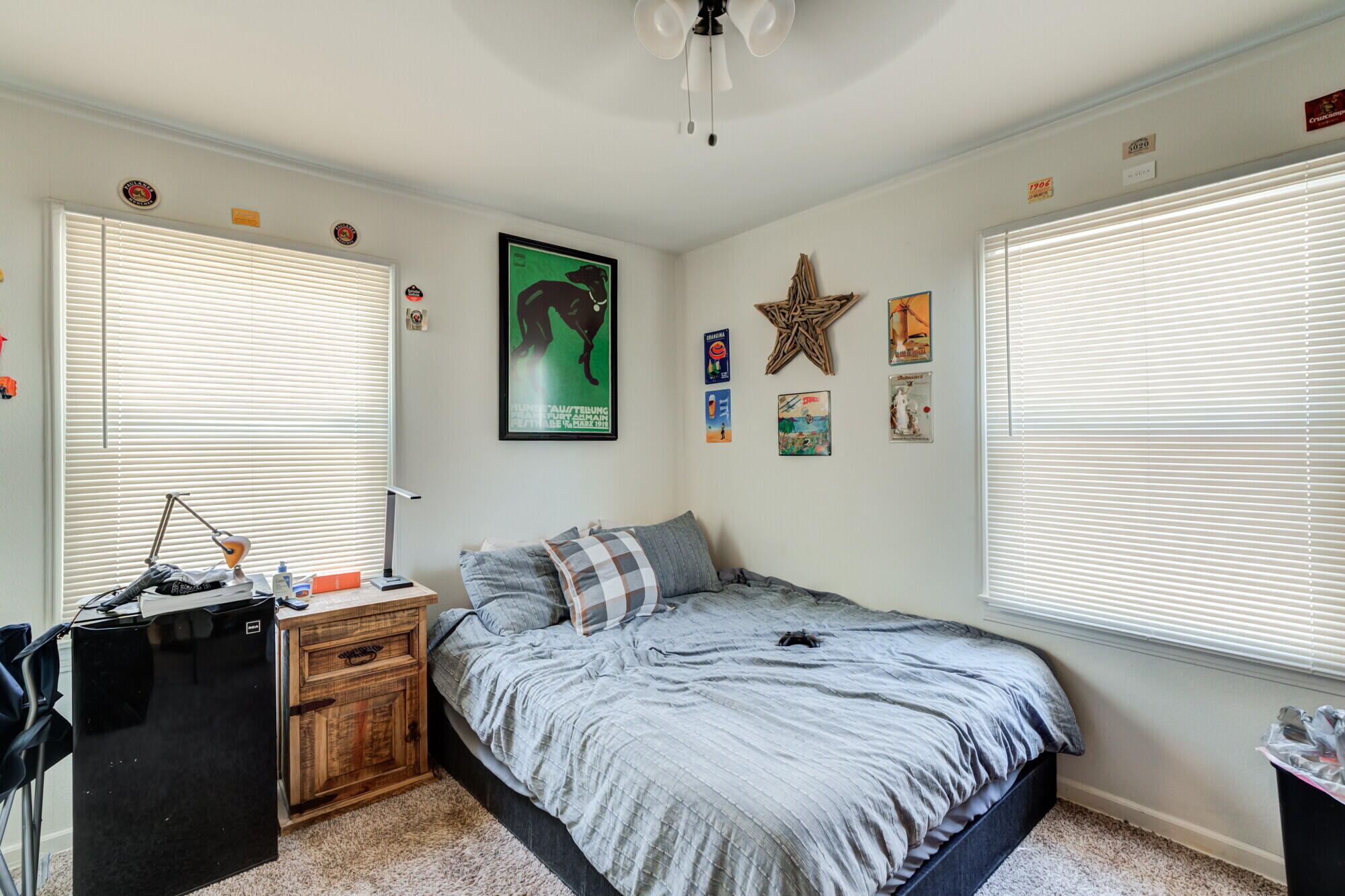3314 31st Street Lubbock, TX 79410 - Photo 15 of 29 a bedroom with a bed and a window