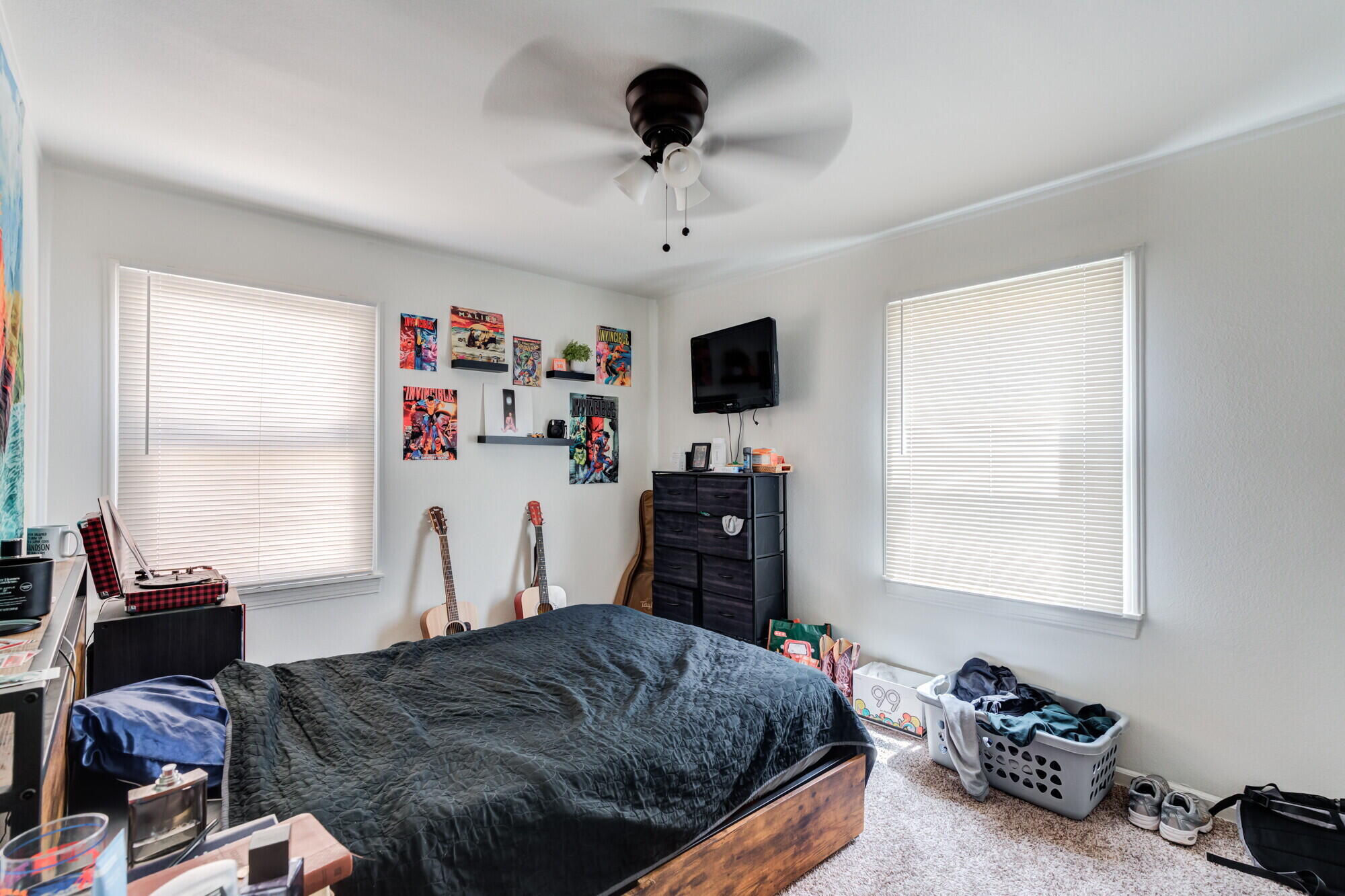 3314 31st Street Lubbock, TX 79410 - Photo 17 of 29 a bedroom with a bed and a window
