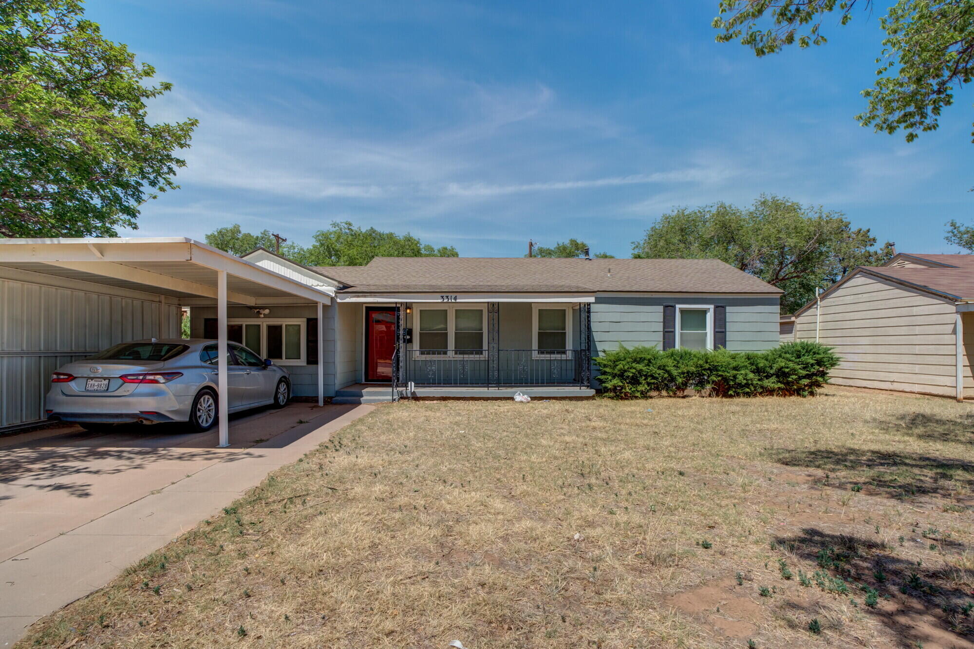 3314 31st Street Lubbock, TX 79410 - Photo 2 of 29 a view of a house with a patio