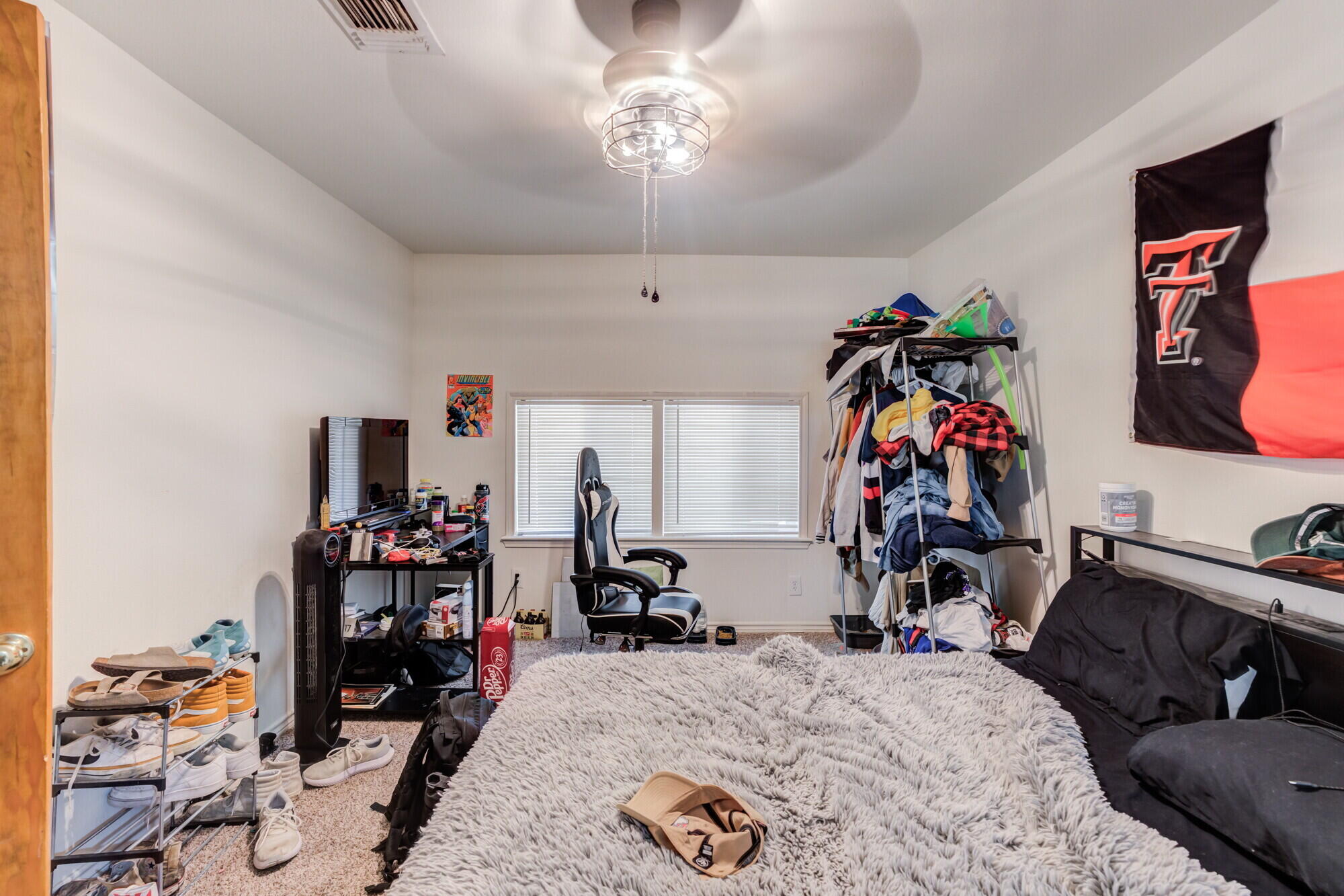 3314 31st Street Lubbock, TX 79410 - Photo 22 of 29 a view of a room with gym equipment