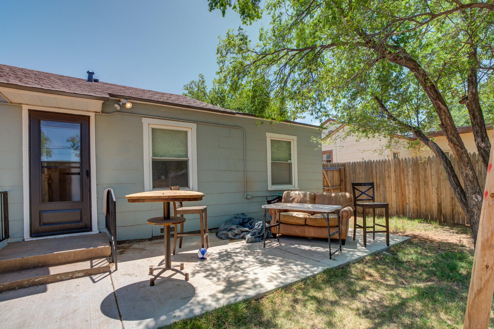 3314 31st Street Lubbock, TX 79410 - Photo 27 of 29 a house view with a sitting space fire pit and outdoor space