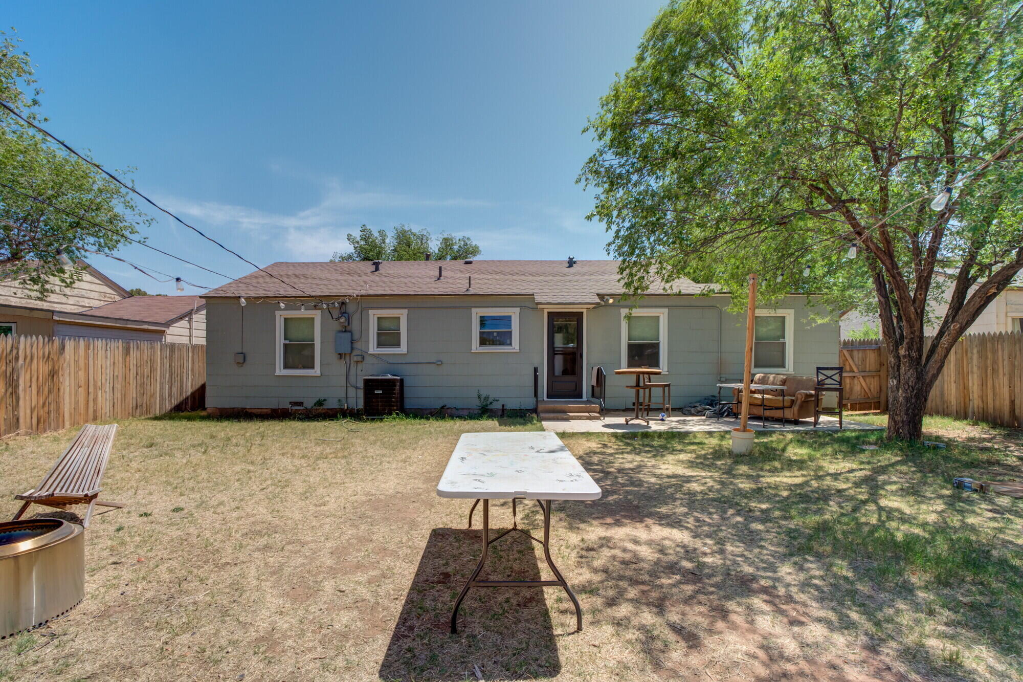 3314 31st Street Lubbock, TX 79410 - Photo 29 of 29 a front view of a house with a yard