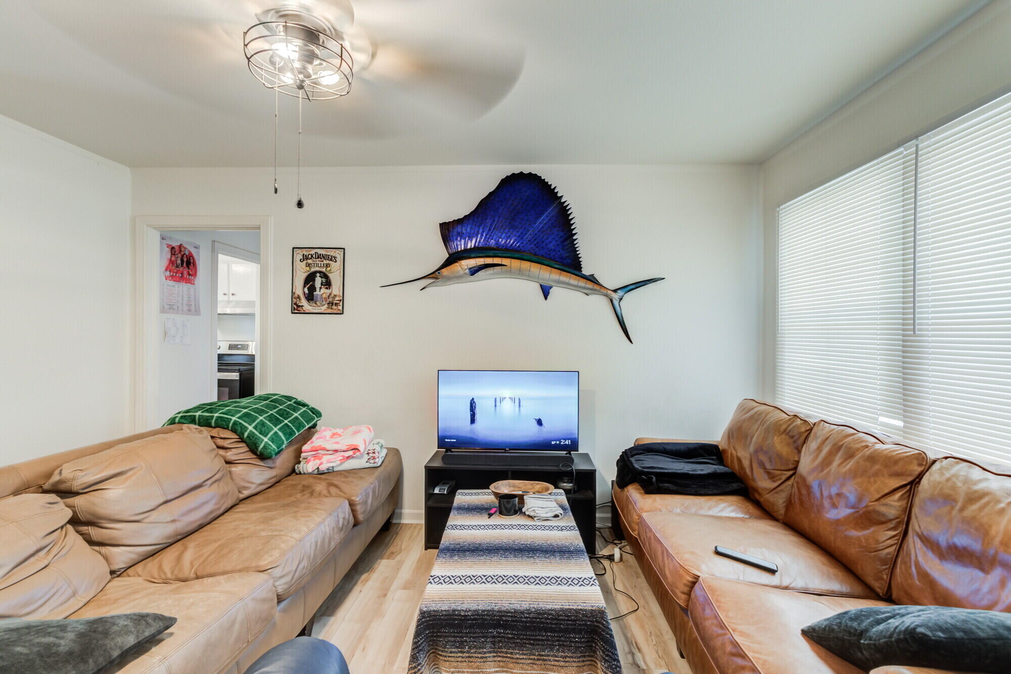 3314 31st Street Lubbock, TX 79410 - Photo 5 of 29 a living room with furniture and a couch