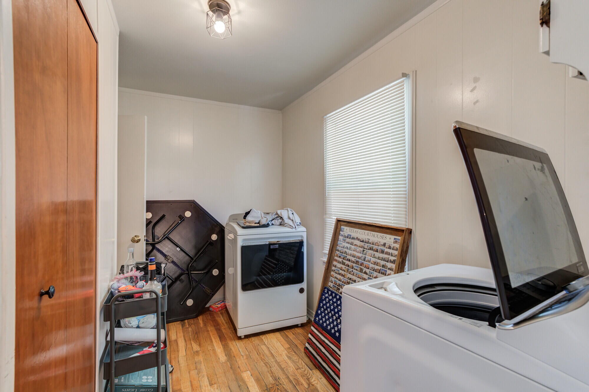 3314 31st Street Lubbock, TX 79410 - Photo 10 of 29 a view of an entryway with wooden floor