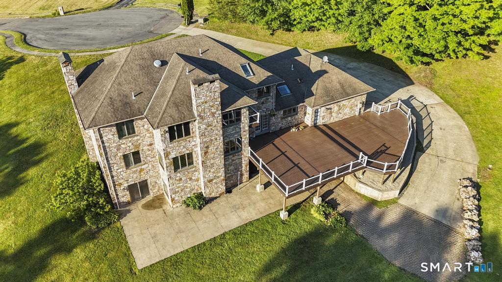 49 Partridge Lane Middletown, CT 06457 - Photo 34 of 39 an aerial view of a house with a swimming pool