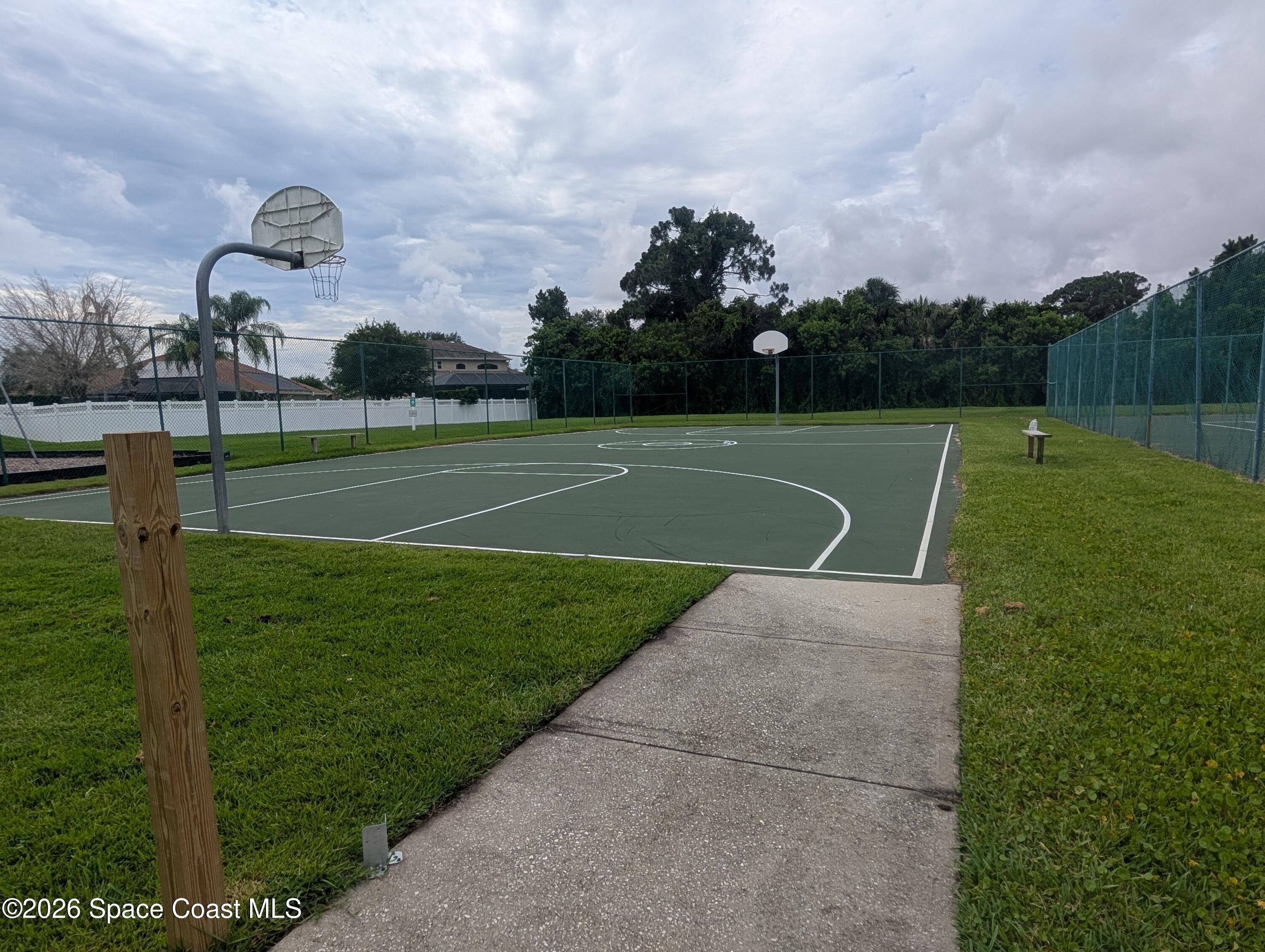 4130 Orion Way Rockledge, FL 32955 - Photo 9 of 14 a view of a golf course with a play ground