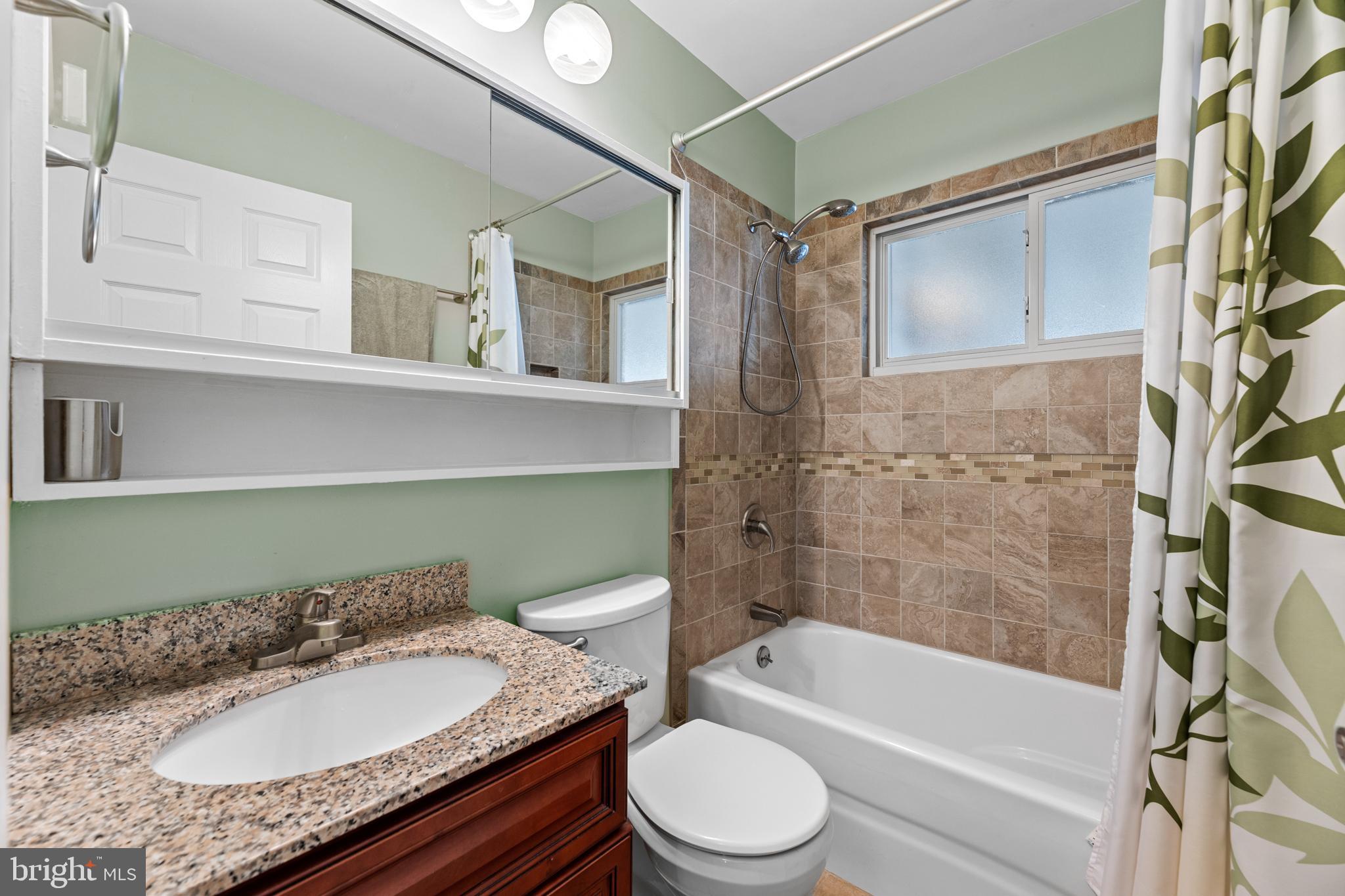 15 Iris Road Levittown, PA 19057 - Photo 18 of 35 First floor updated full bath
