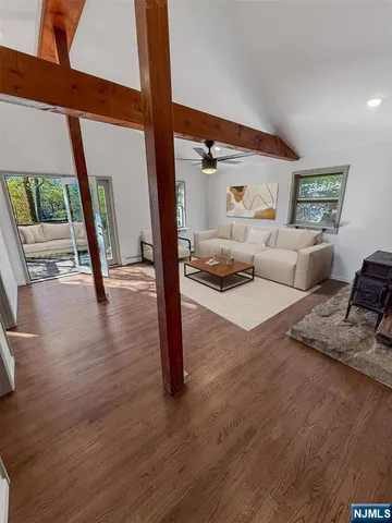 a living room with furniture and a table