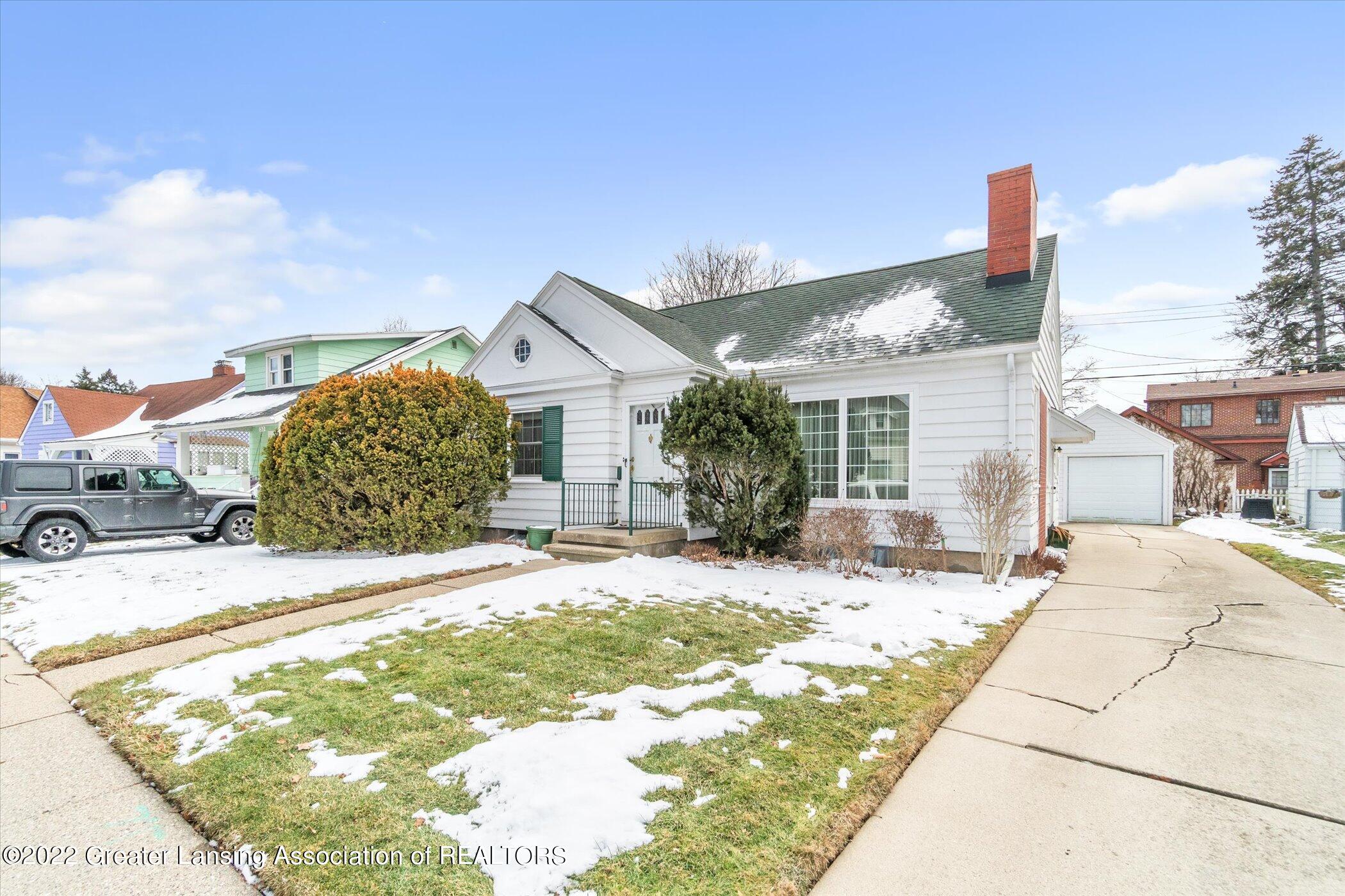 319 Kensington Road Lansing, MI 48910 - Photo 4 of 36 04-319-Kensington-RdWindowStill-Real-Est