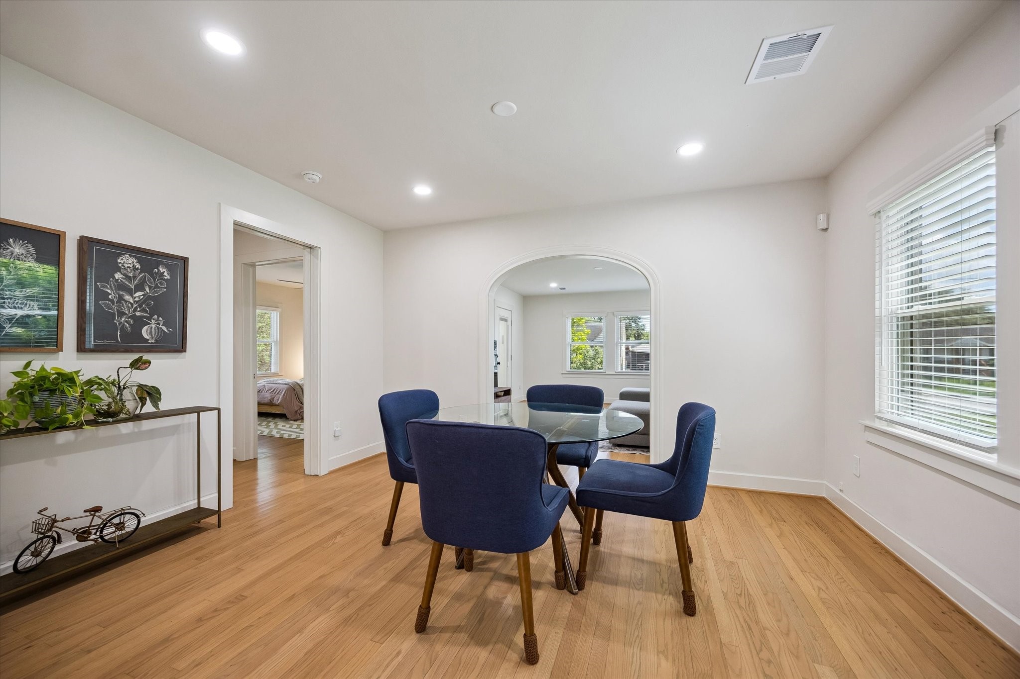 809 Gale Street Houston, TX 77009 - Photo 6 of 18 Light filled dining room with hardwood flooring, recessed lighting, and timeless arched details.