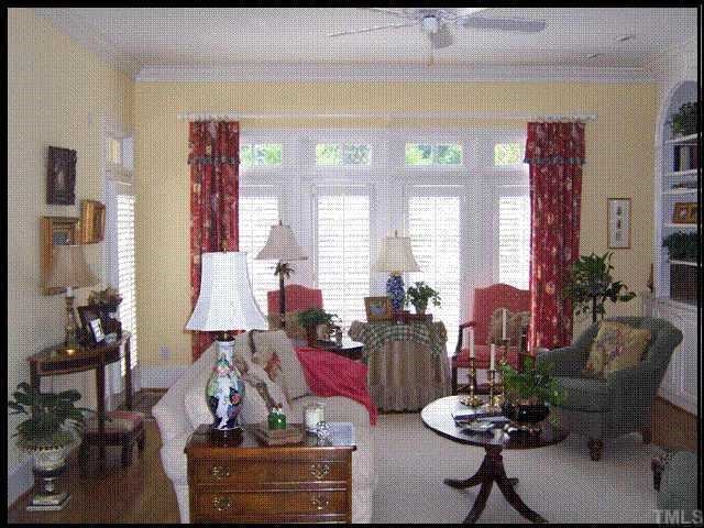 1701 Knox Road Raleigh, NC 27608 - Photo 5 of 6 a living room with furniture and a large window