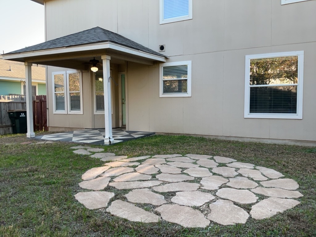 305 Avalanche Avenue Georgetown, TX 78626 - Photo 21 of 22 a front view of a house with a yard