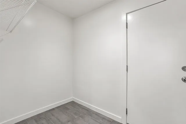 a view of small space with racks on the wall