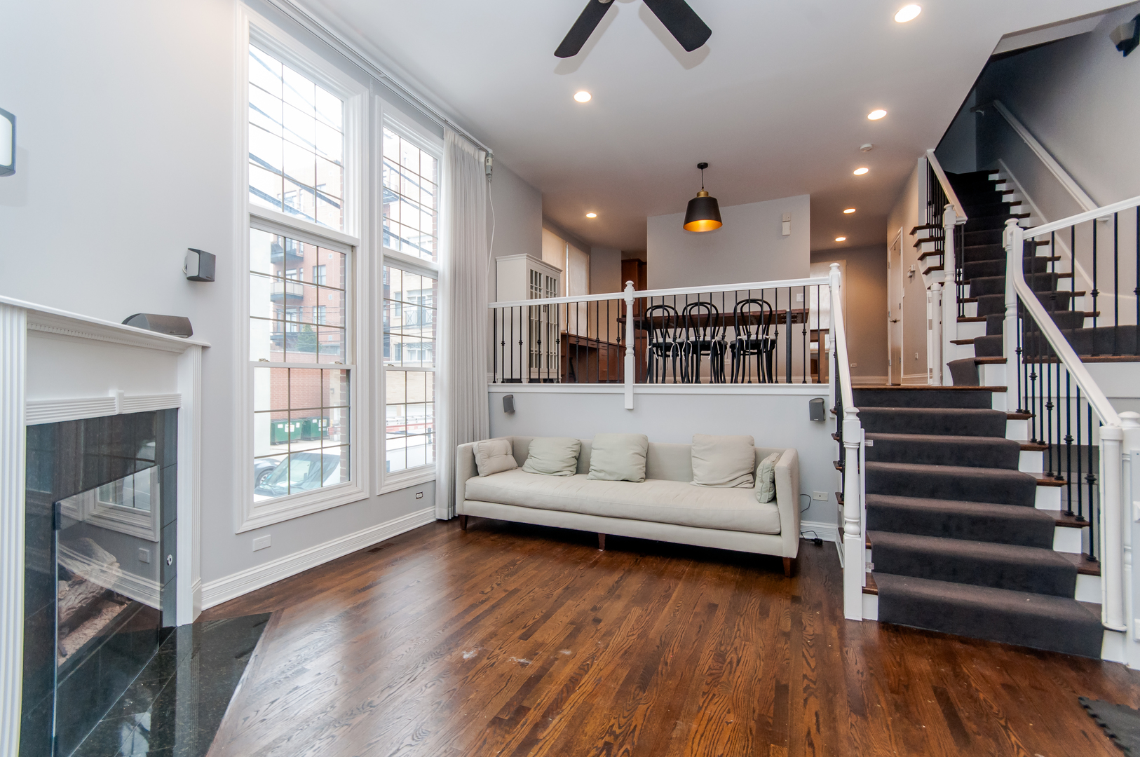 24 North Ada Street, Unit I Chicago, IL 60607 - Photo 3 of 12 a living room with furniture and a wooden floor
