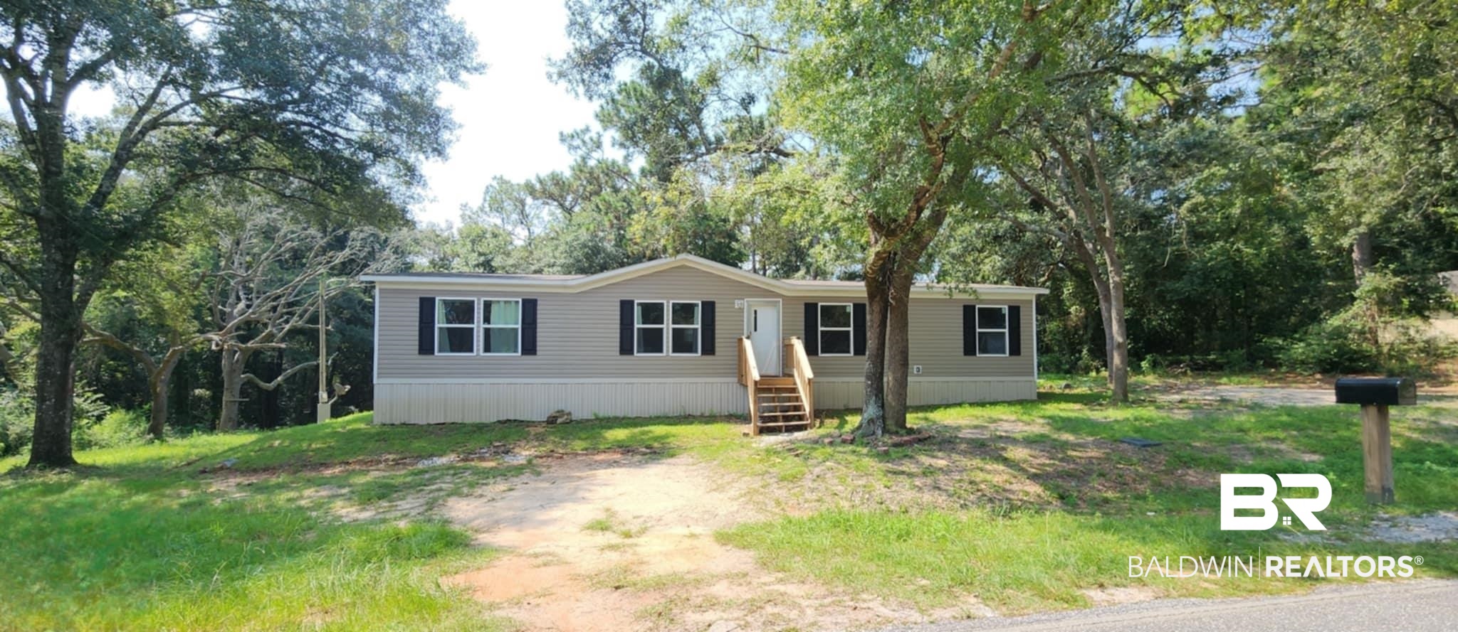 25474 Waterworld Road Robertsdale, AL 36567 - Photo 1 of 30 Manufactured / mobile home with view of wooded area