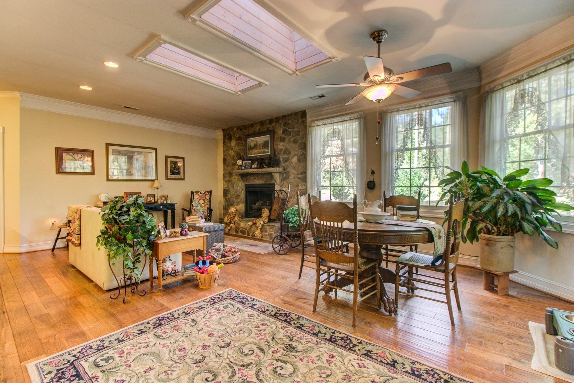 583 Calypso Road Moneta, VA 24121 - Photo 14 of 50 a living room with furniture and wooden floor