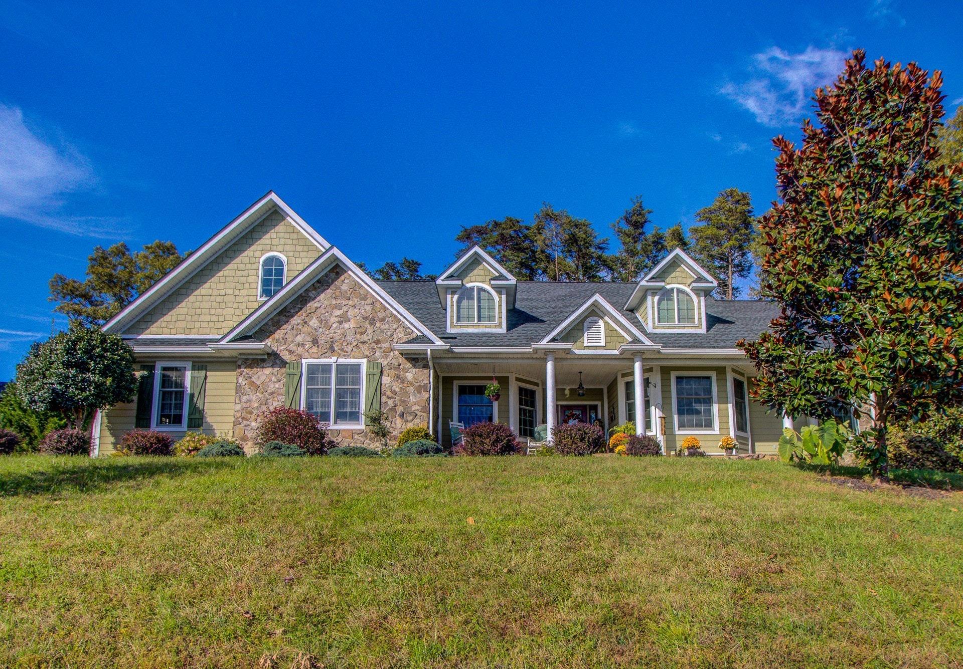 583 Calypso Road Moneta, VA 24121 - Photo 3 of 50 a front view of a house with a porch