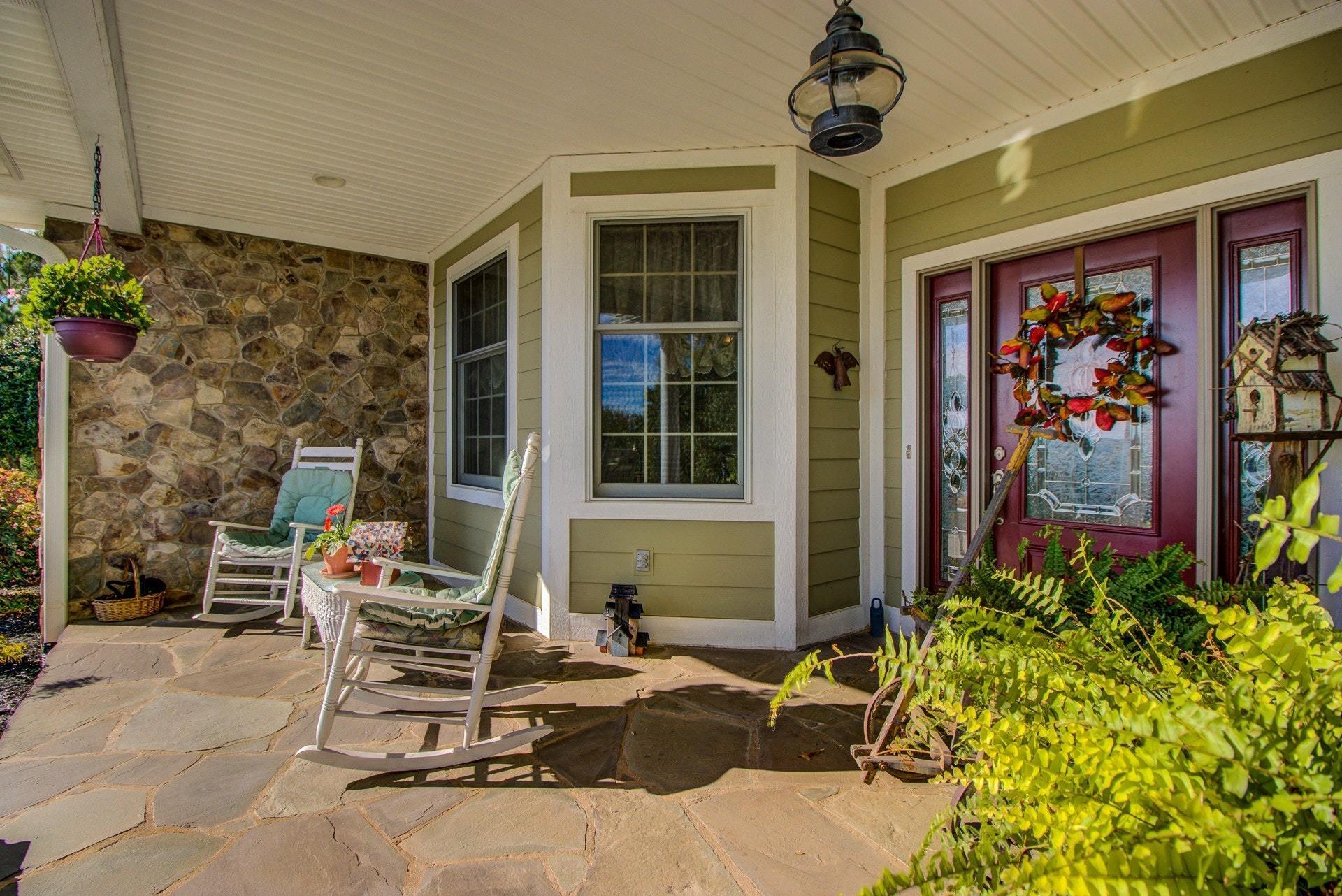 583 Calypso Road Moneta, VA 24121 - Photo 8 of 50 a view of a chairs and tables in patio