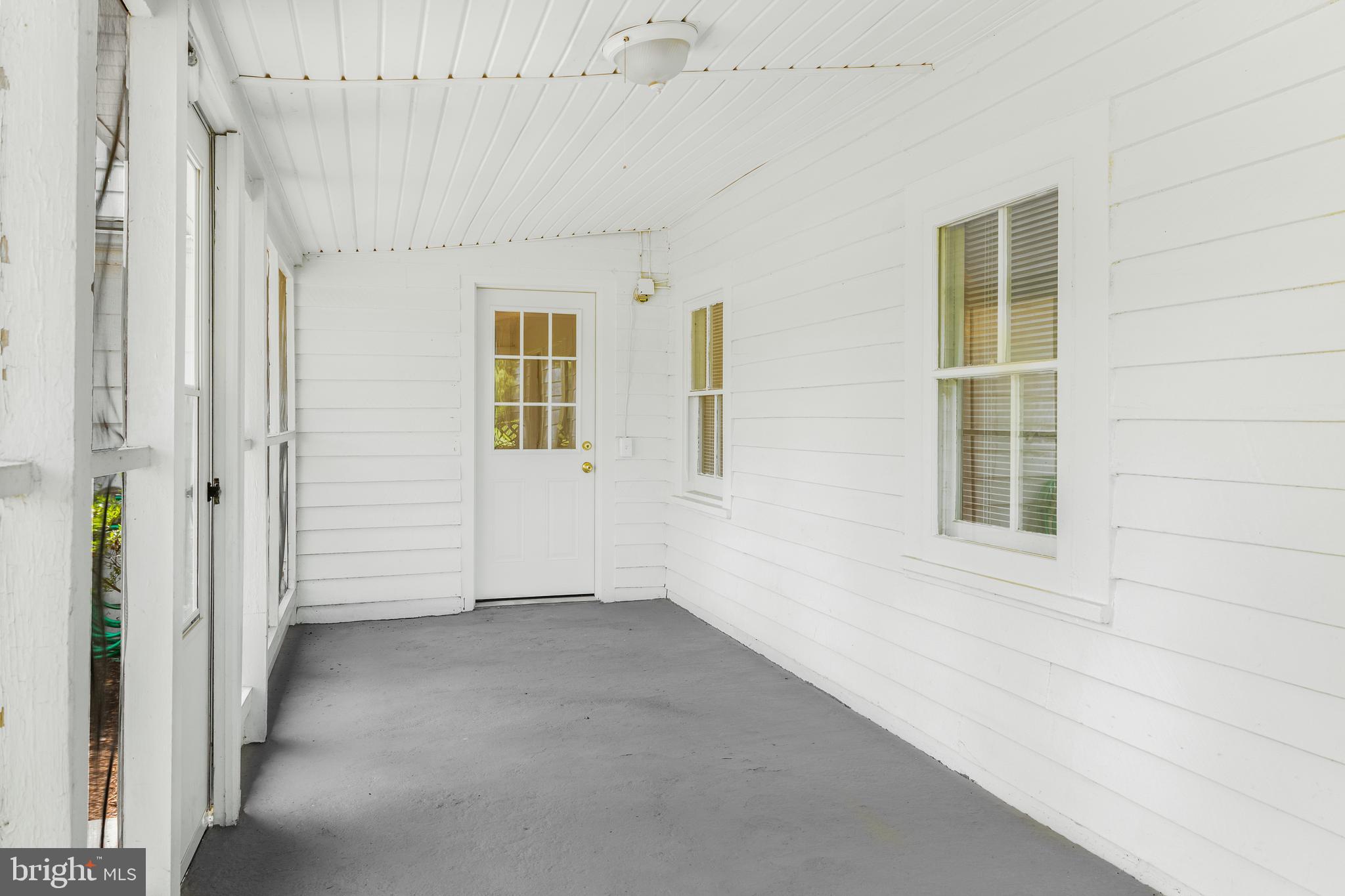 10287 Dahlgren Road King George, VA 22485 - Photo 14 of 54 an empty room with windows