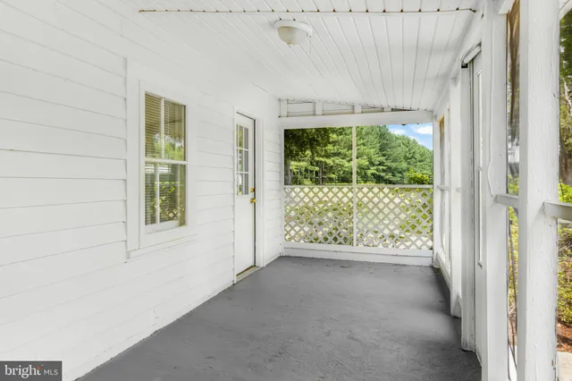 a view of a swimming pool and an outdoor space