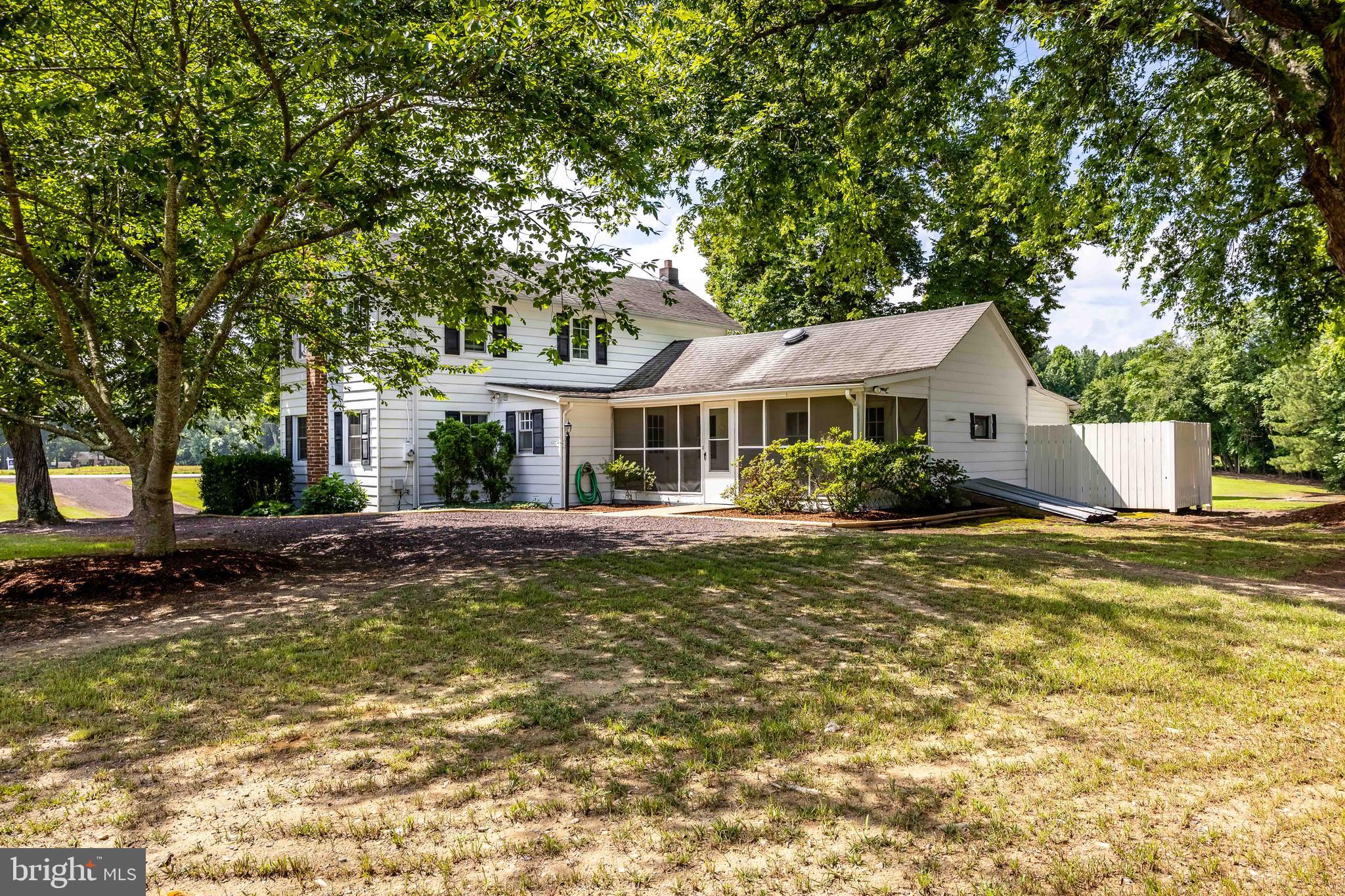 10287 Dahlgren Road King George, VA 22485 - Photo 2 of 54 a front view of a house with swimming pool