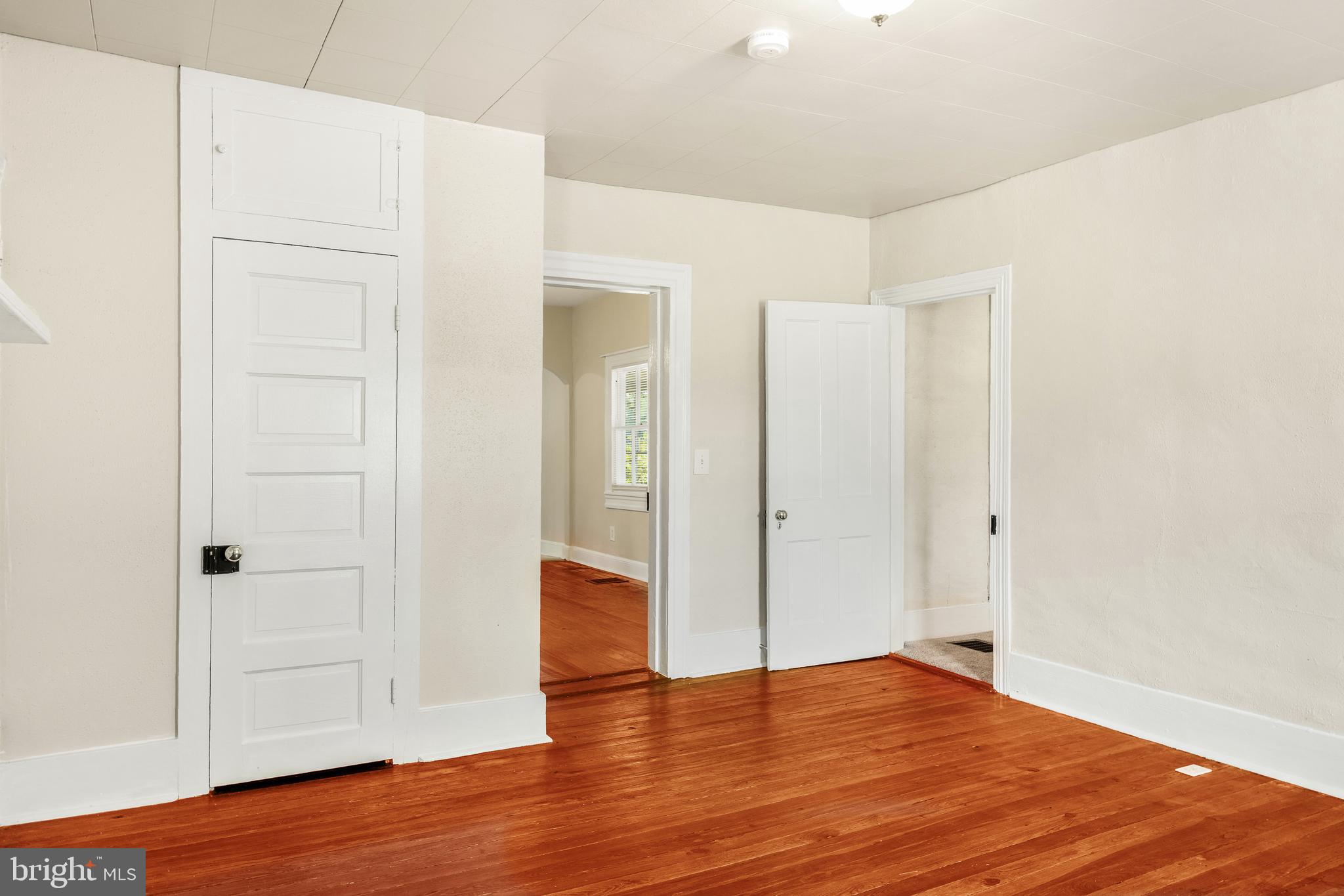 10287 Dahlgren Road King George, VA 22485 - Photo 22 of 54 a view of empty room with wooden floor