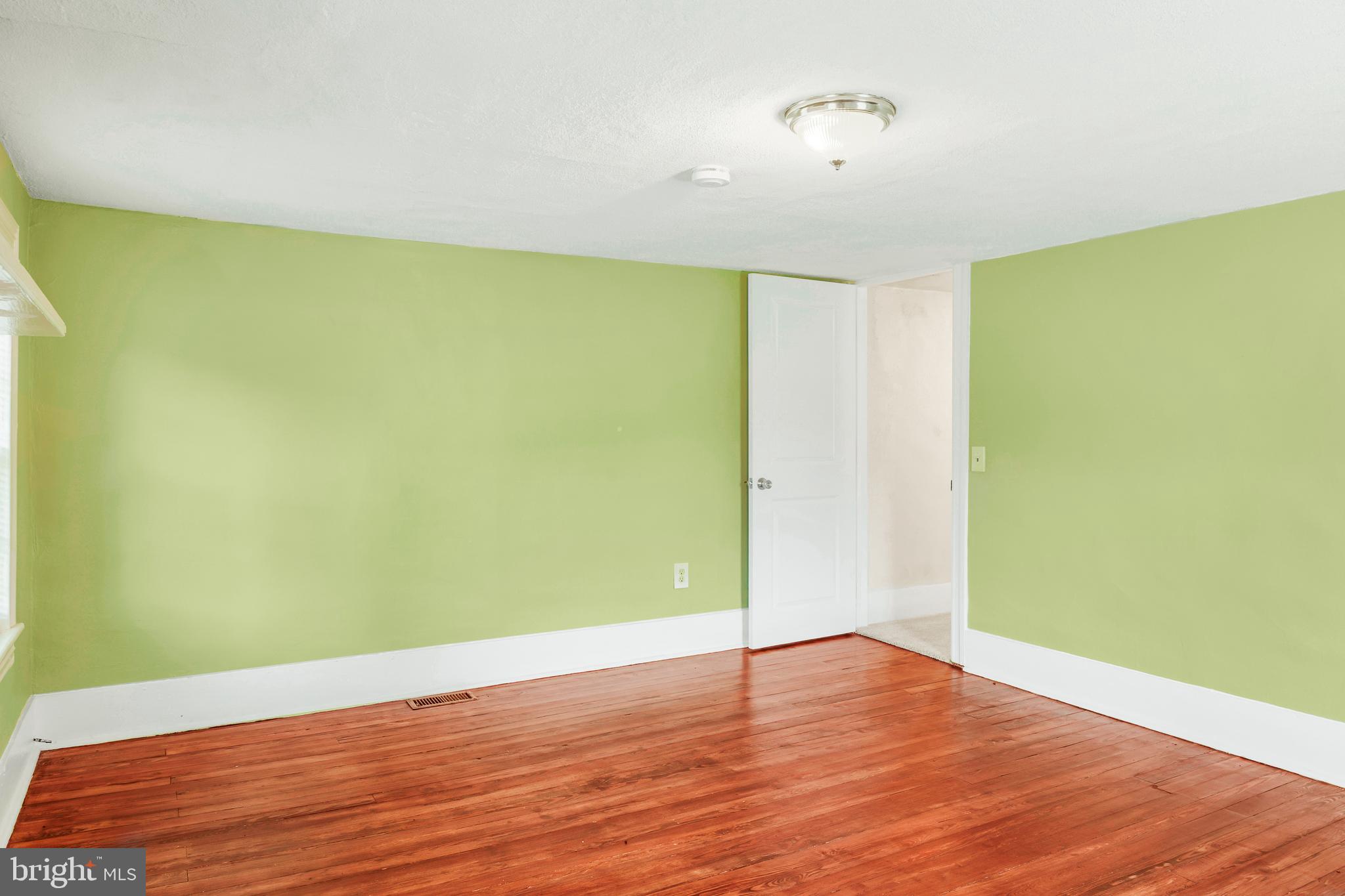 10287 Dahlgren Road King George, VA 22485 - Photo 26 of 54 a view of room with wooden floor